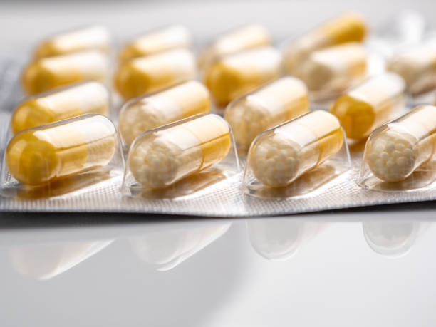 istock Vitamin C capsules on a white background. 1425294824