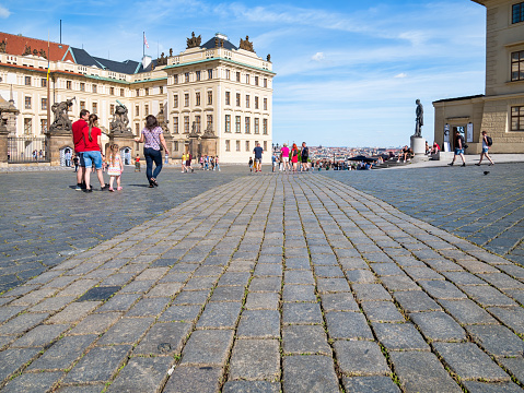 Prague, Czech Republic - June 2022: Scenic view from the cobblestone streets in front of New Royal Palace part of the Prague Castle
