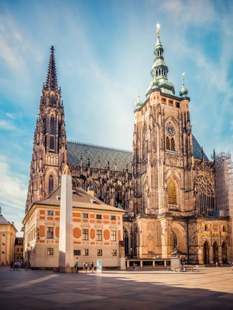 beautiful view with the gothic towers of st. vitus cathedral located in prague castle. close up detail. - st vitus katedrali stok fotoğraflar ve resimler