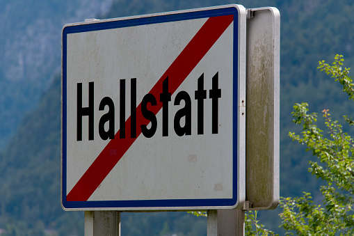 Close-up of the sign to indicate the end of the world-famous market town of crossed out Hallstatt in the Salzkammergut region of Upper Austria