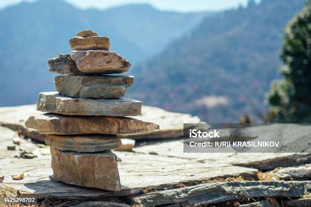 Pyramids Of Stones Against The Background Of Mountains The Concept Of Balance And Tranquilityyoga In The Nature In The Mountains Stock Photo - Download Image Now