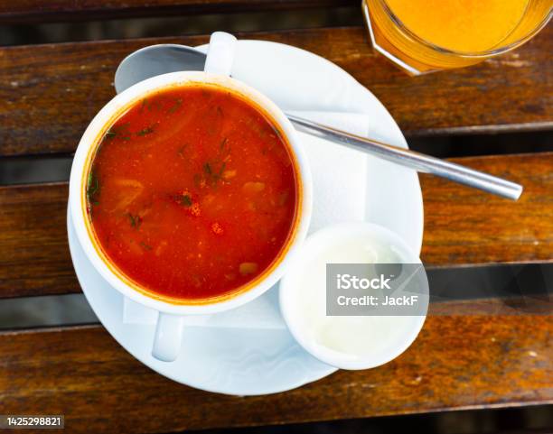 Ceramic Bowl With Hodgepodge On A Wooden Table Stock Photo - Download Image Now - Boiling, Bouillon, Ceramics