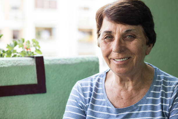 istock Senior woman wearing smile 1425302212