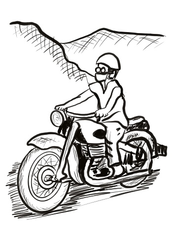 a person riding a old motorcycle