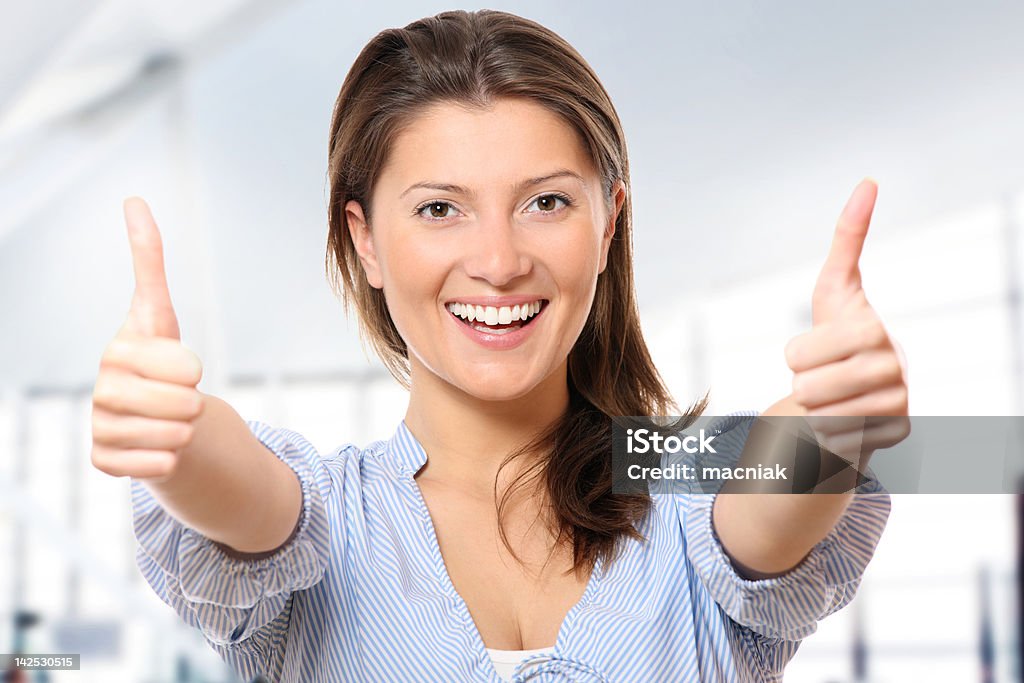 Positive attitude A portrait of a young positive woman over modern background Adult Stock Photo