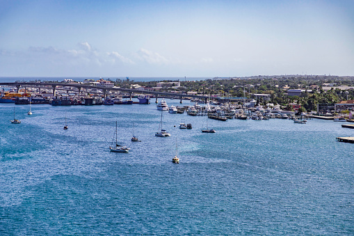 Panoramic view of the Atlantic Ocean in the distance, the bridge to Paradise Island and the marina and seaport on Nassau Island in the Bahamas
