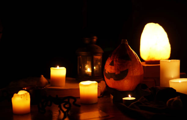 istock candles pumpkin light darkness halloween table 1425312870