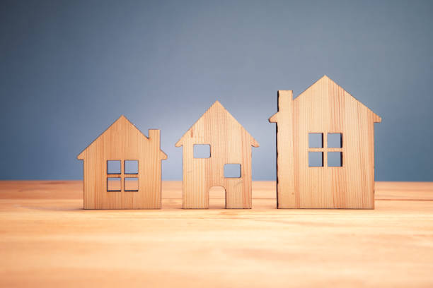 istock many toy wooden house models 1425319272