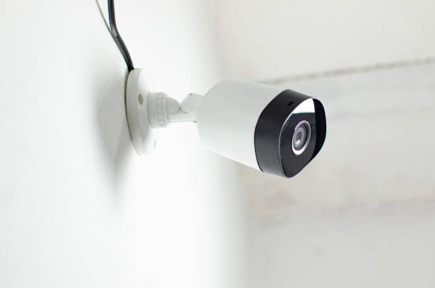 istock CCTV videocam, CFTV security camera, white camera with secure circuit, theft protection. Surveillance view. 1425328597