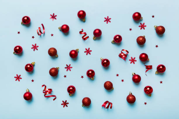 istock Christmas composition. a pattern of christmas balls on colored background. Flat lay, top view New year decor 1425328602