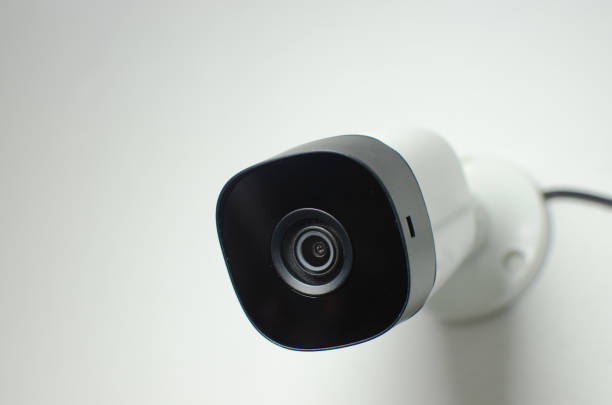 istock CCTV videocam, CFTV security camera, white camera with secure circuit, theft protection. Surveillance view. 1425328753
