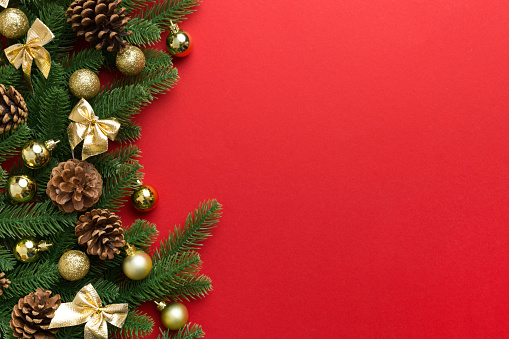 Christmas background with fir branches and Christmas decor. Top view, copy space for text.