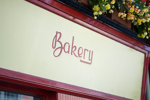 Close up of Bakery sign painted on building