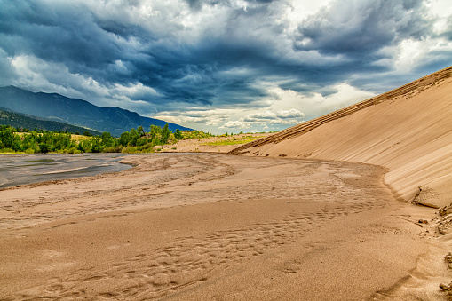 Landscape of areas within Colorado's Great Sand Dunes National Park.