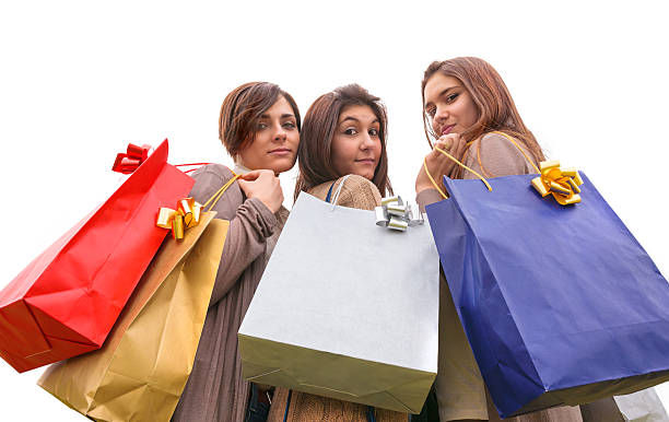 istock happy girls doing shopping 142534069