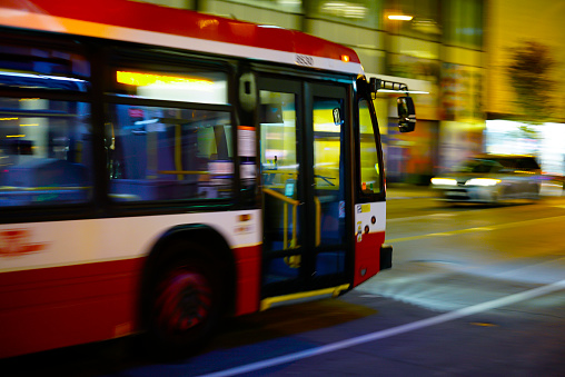Toronto bus in blurred motion.