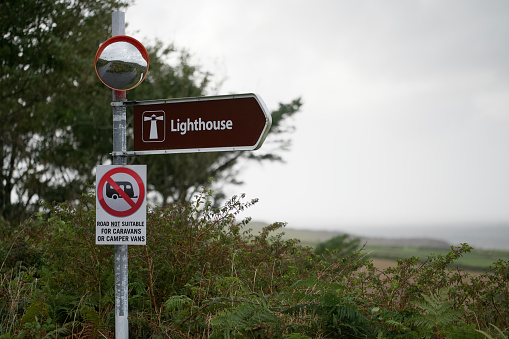 Lighthouse road sign with warning for campers and caravans