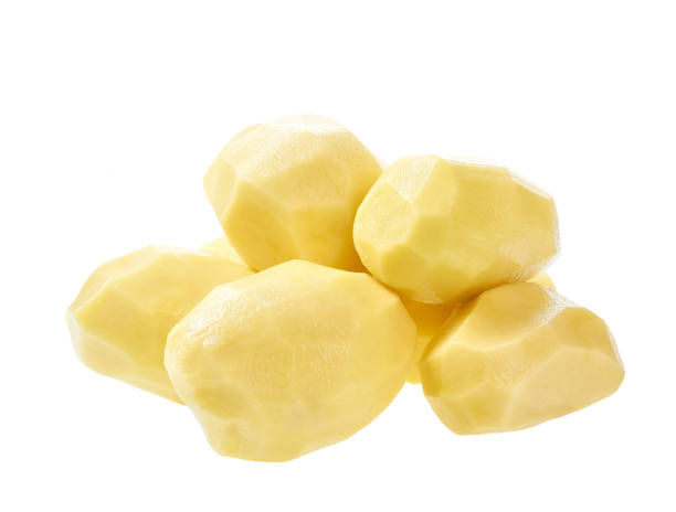 istock Raw peeled potatoes isolated on a white background. 1425353983