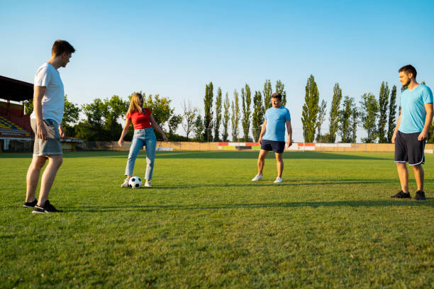 istock Group of people deferent age playing soccer for fun, team 1425357664