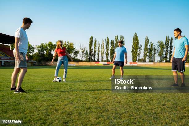Group Of People Deferent Age Playing Soccer For Fun Team Stock Photo - Download Image Now