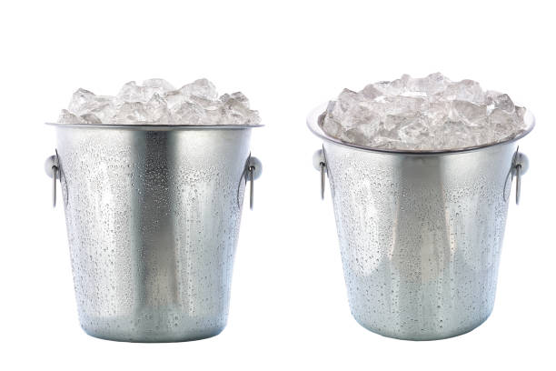 istock Full metal bucket with crushed ice isolated on white background. 1425357866