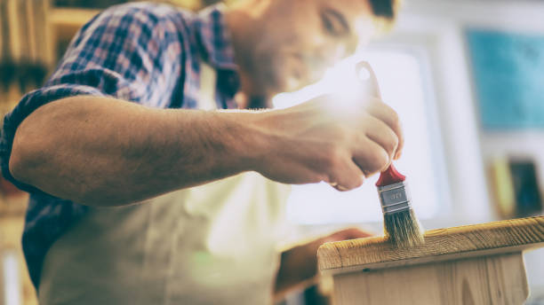istock Detailed view of hand with brush 1425367457