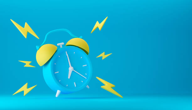 istock Blue vintage ringing alarm clock with yellow lightings 1425367847
