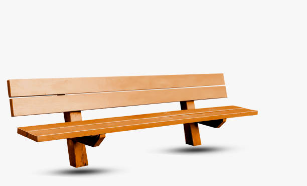 istock A classic brown wood park bench isolated against a white background with clipping path. 1425370937