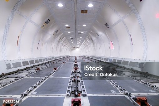 istock Interior view of a huge cargo airliner 1425372661
