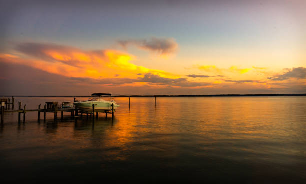 istock Sunset on the River and Boat 1425379569