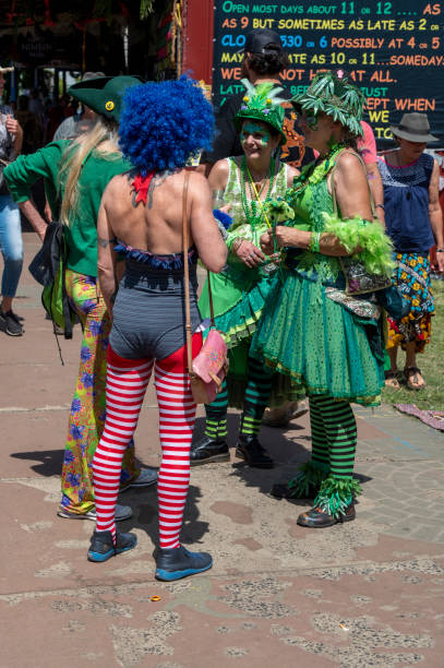 Nimbin, NSW; September 18, 2022\nGanga Faeries gather before marching m in the 30th Mardi Grass parade. Nimbin.\n30th Mardi Grass. Every year the small NSW town of Nimbin {famous for the 1973 Aquarius Festival} holds a rally to march for the legalisation of cannabis. Law reform still has a long way to go even for the use of medicinal cannabis. The parade has a large number of colourful characters. It is a non ticketed public event. There are also sports games and a two day conference in  the town hall on the nature and future of cannabis. A feature of the parade is a group of dancing Ganja Faeries. They range form 8 to 80 and rehearse a travelling dance all year.