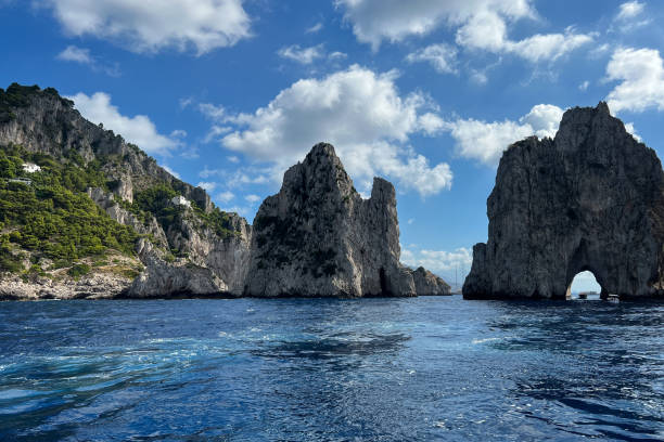 istock Capri's island Faraglioni rock view from sea surface 1425384357