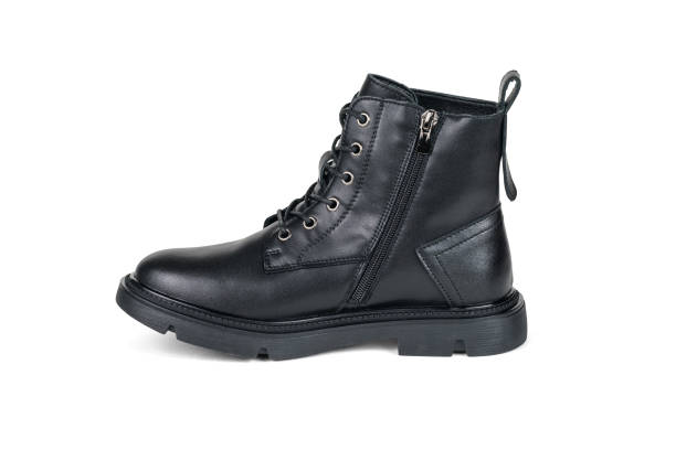 istock Leather boot with zipper and laces insulated on a white background. 1425388708