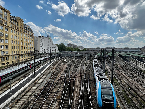 Railroad tracks in Paris with clouds