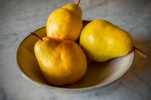 Bartlett pears on a table