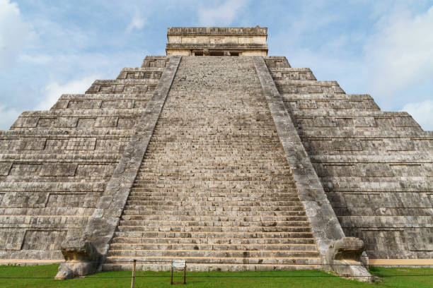 istock View from the grass up the main steps of El Castillo (Temple of Kukulkan) in Chichen Itza 1425402918