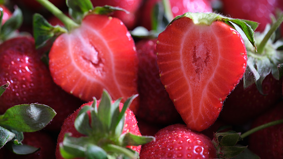 Delicious ripe sweet sliced strawberry. Growing strawberries concept