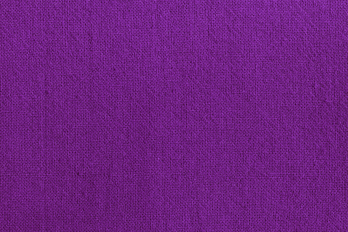 Purple fabric cloth texture background, seamless pattern of natural textile.