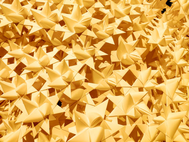 istock Honeycomb structure made of paper stars 1425419742