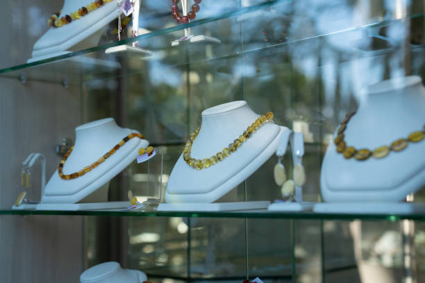 istock Beautiful amber necklaces in a showcase. 1425423275