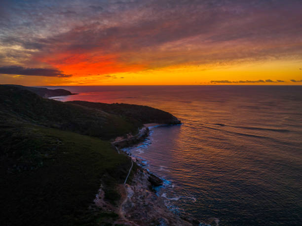 istock High cloud sunrise over the beach and mountain 1425426142