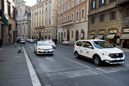 Rome - 10/28/2021: taxi in corso Vittorio Emanuele II, downtown Rome, Italy.