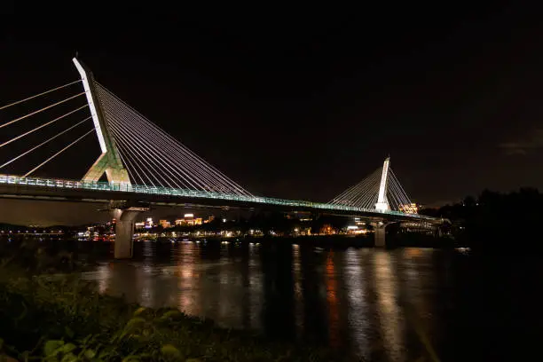 Daegu city, South Korea - May 5, 2022 : Dongchon Sunrise Bridge is a cable-stayed bridge across the Geumhogang River located in Dong-gu, Daegu, and is famous for its beautiful scenery in the morning when the morning sun rises.