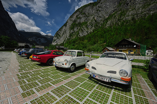 Hallstatt, Austria - May 15, 2022: Classic cars at car parking Hallstatt.