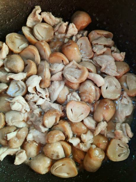 istock Cooking Stir fried Mushrooms with chicken - food preparation. 1425431812