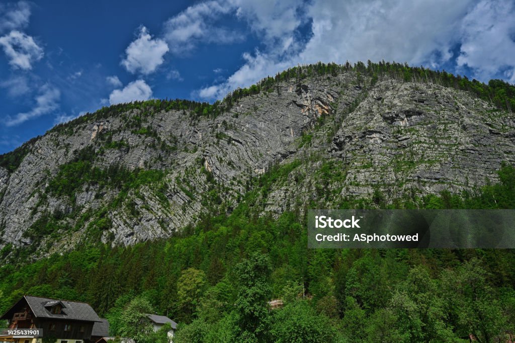 Scenic view of rock at Hallstatt mountain village in the Austrian Alps, Salzkammergut region. Adventure Stock Photo