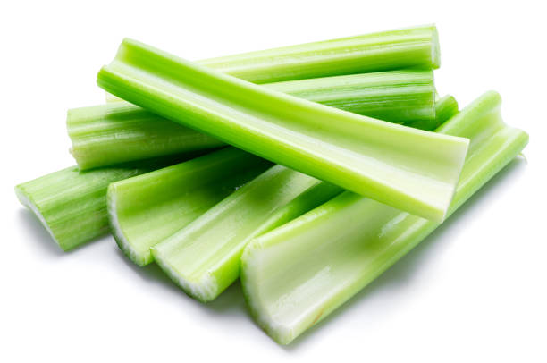 istock Pile of celery ribs isolated on white background. 1425432271