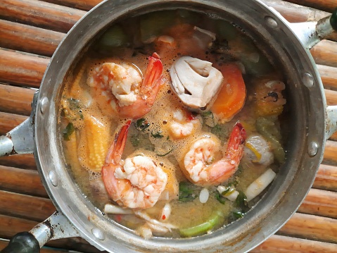 Spicy Mixed Vegetable soup with Shrimps - Thai food preparation.