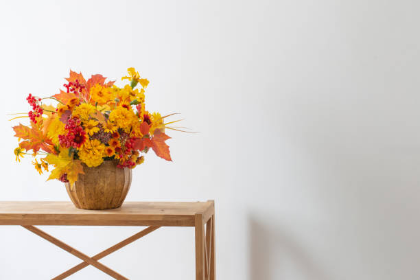 istock autumnal bouquet in ceramic vase on white background 1425435034