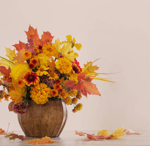 istock autumnal bouquet in ceramic vase on gray background 1425435132